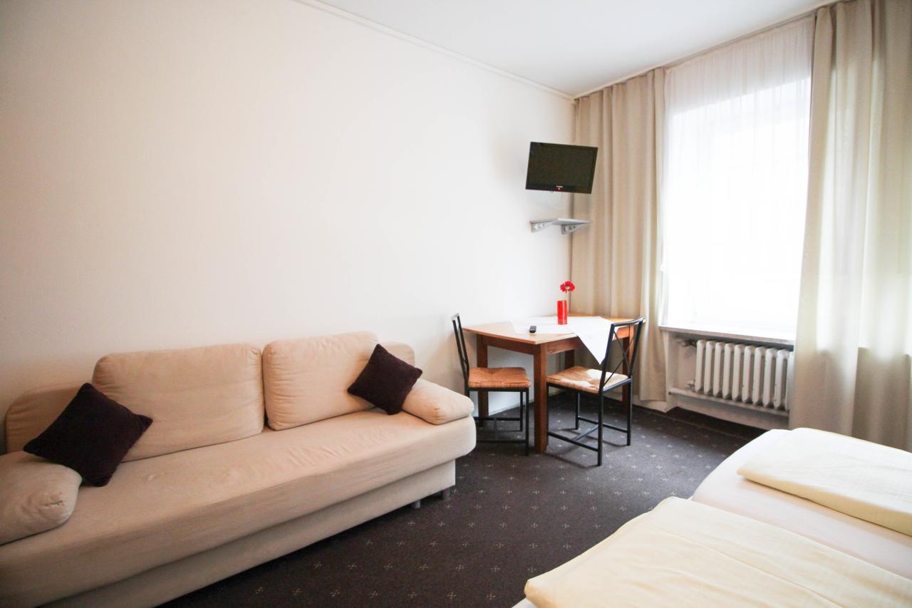 Hotel Pension Am Hauptbahnhof Мюнхен Стая снимка